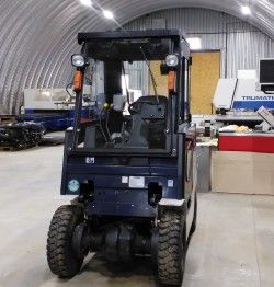 Металлическая кабина на погрузчик TCM 1,5т специсполнение под набивные стеллажи